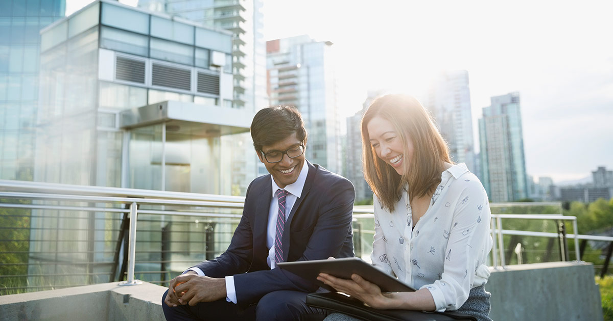 Businessman and businesswoman using digital tablet in city, device, meeting, man, woman, two people, outsoors, building, diverse, Asian