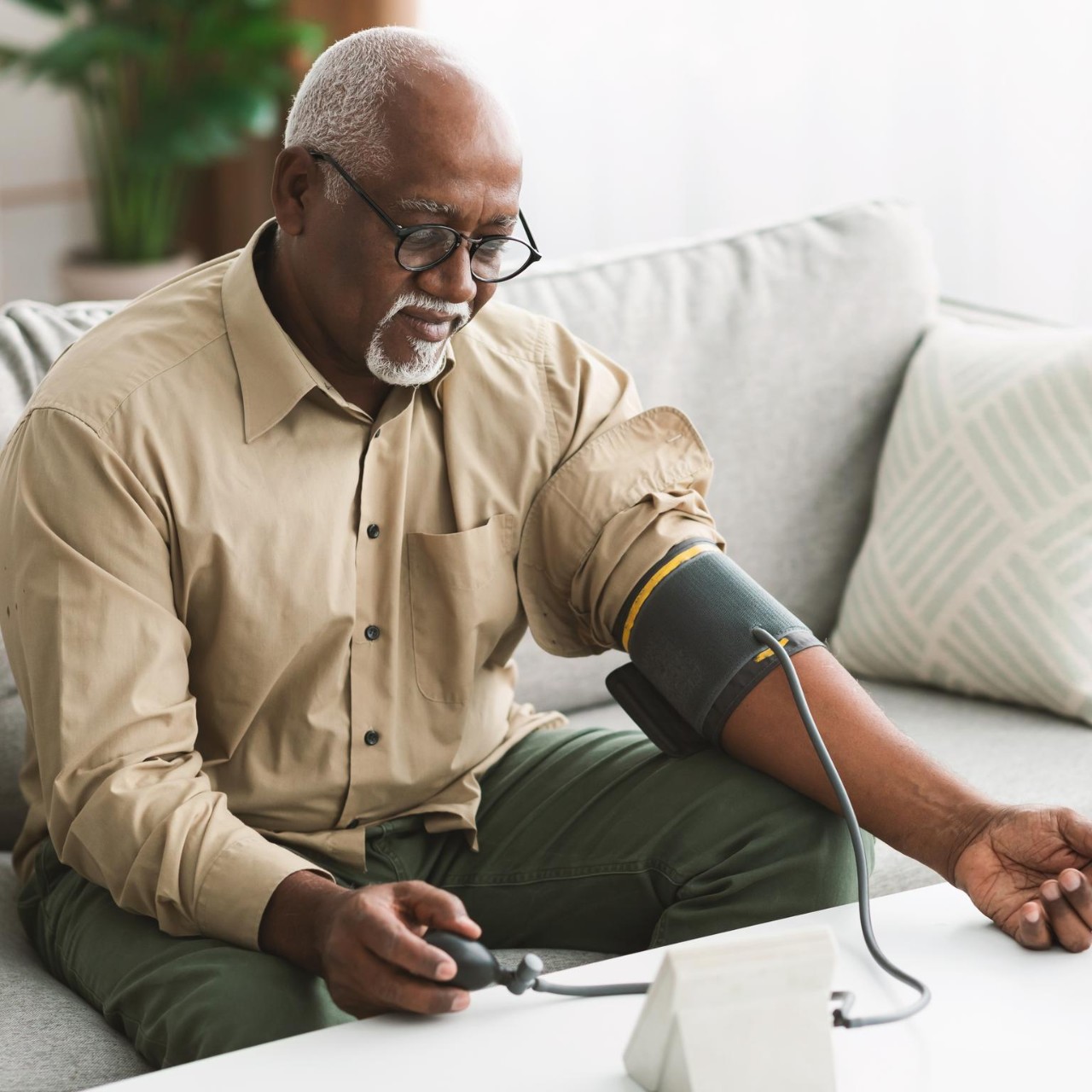 Senior African American Male Measuring Arterial Blood Pressure